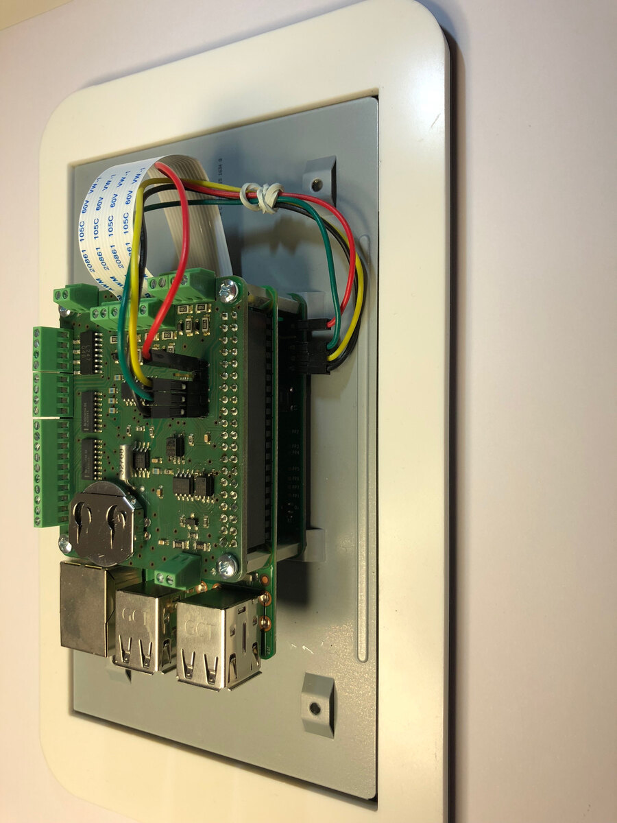 Zephirion Swiss Knife Pi HAT installed behind a display